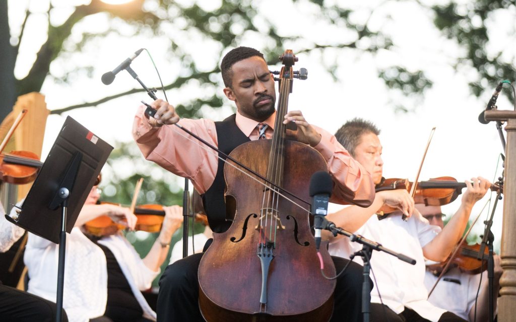 Cellist and TDP alumnus Khari Joyner solos with the ASO at Piedmont Park in 2018