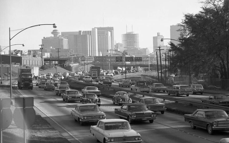 The Atlanta skyline in 1968, looking south along the expressway toward North Avenue and the downtown skyline. The Equitable Building is the skyscraper under construction. (source: Atlanta Time Machine)]