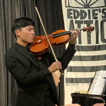Violist Zhenwei Shi. Pianist Elizabeth Pridgen is behind him. (credit: Niki Baker)