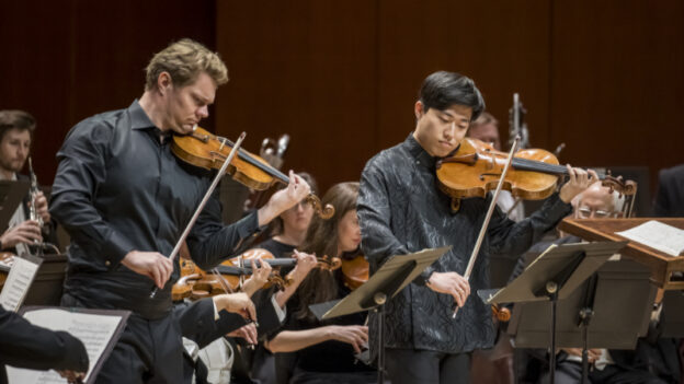 Concertmaster David Coucheron and principal violist Zhenwei Shi solo in Mozart's "Sinfonia Concertante" with the Atlanta Symphony Orchestra. (credit: Rafterment)