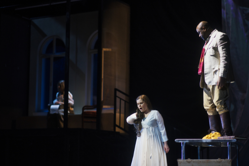 Melissa Harvey as Hébé and Jorell Williams as Alexandre in Catapult Opera's production of "La ville morte." Background: Laurie Rubin as Anne. (credit: Marcus Shields)