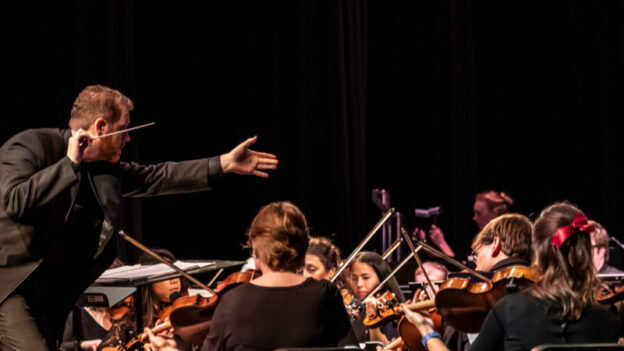 Music director Timothy Verville conducts the Georgia Symphony Orchestra. (credit: Tom Kells)