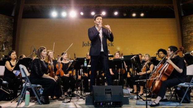 Henry Cheng on the podium with the Johns Creek Symphony Orchestra in October 2024. (courtesy of JCSO)