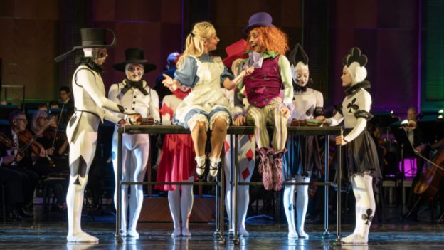 Bruce Wood Dance Dallas joins forces with Robert Spano and the Fort Worth Symphony Orchestra in a suite of scenes from Joby Talbot’s ballet, “Alice’s Adventures in Wonderland.” Pictured: Alice, the Mad Hatter and a six-pack of playing cards. (credit: Karen Almond)