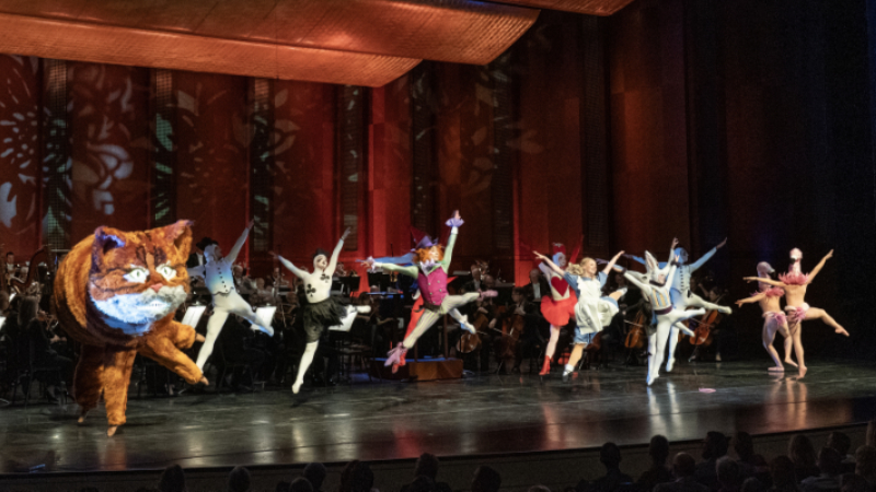 Bruce Wood Dance Dallas in a buoyant scene from Talbot’s “Alice” suite with the Fort Worth Symphony Orchestra. (credit: Karen Almond)