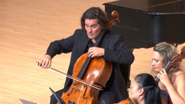 Cellist Zuill Bailey (center) plays the solo part in Schubert's Arpeggione Sonata, arranged for solo cello and string quartet at KSU's Morgan Hall. Lower right: violist Yinzi Kong and cellist Charae Krueger. (uncredited)