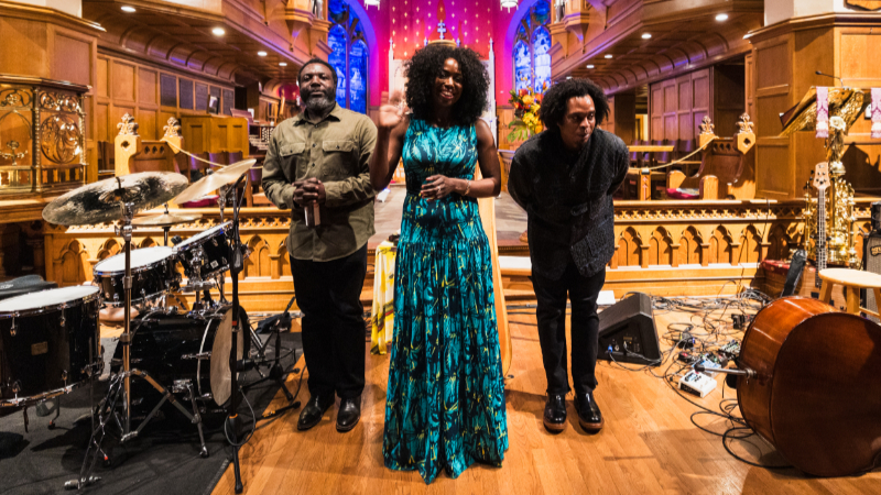 Brandee Younger Trio at All Saints' Episcopal Church in Atlanta. L-R: Allan Mednard, Brandee Younger, and Rashaan Carter. (credit: Dustin Chambers Photography)