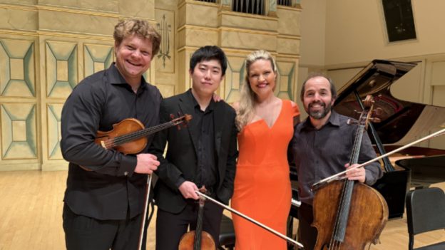 L-R: David Coucheron, Zhenwei Shi, Julie Coucheron, and Efe Baltacigil pose for the camera following their concert at Spivey Hall. (credit: Maggie Liu)