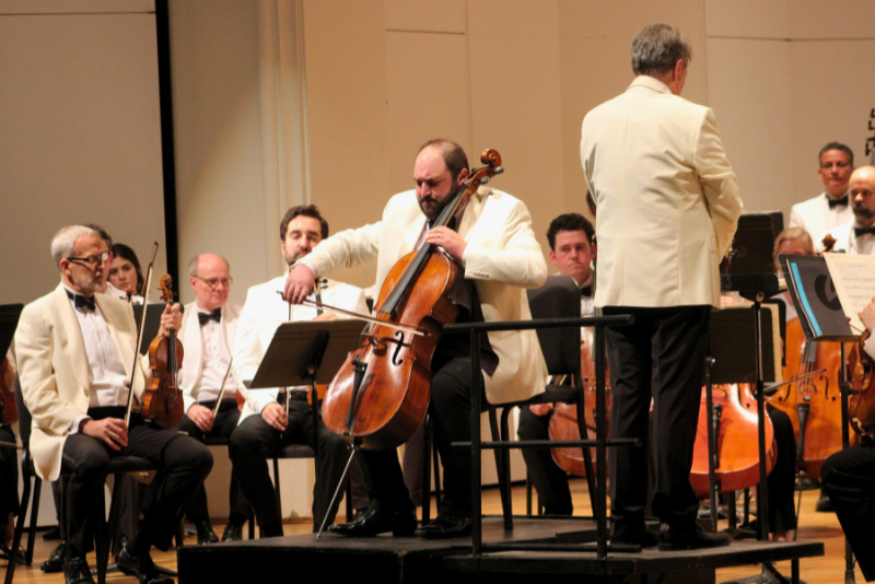Cellist Julian Schwarz solos with the Eastern Festival of Music Orchestra, with his father, conductor Gerard Schwartz on the podium, July 4, 2026. (credit: Sarah Lucas-Page)