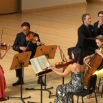 Violinists Helen Hwaya Kim & Kenn Wagner, violist Yang-Yoon Kim, cellist Charae Krueger, and pianist Robert Henry perform Dvořák’s "Piano Quintet in A major" at KSU’s Morgan Hall. (video stream still)
