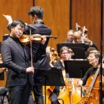 Violinist Simon Zhu performs Tchaikovsky’s Violin Concerto with the Johns Creek Symphony Orchestra, led by music director Henry Cheng, at the Sandy Springs Performing Arts Center, Ocober 9, 2026. (credit: Ken Otloff)