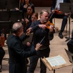 Justin Bruns solos in Mendelssohn's "Violin Concerto" with the Nporth Carolina Symphony, led by Carlos Miguel Prieto. (courtesy of NCS)