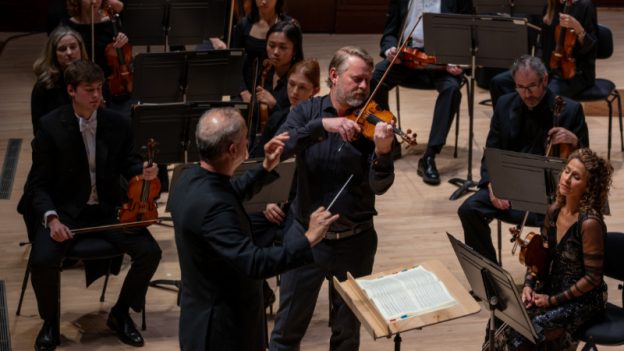 Justin Bruns solos in Mendelssohn's "Violin Concerto" with the Nporth Carolina Symphony, led by Carlos Miguel Prieto. (courtesy of NCS)